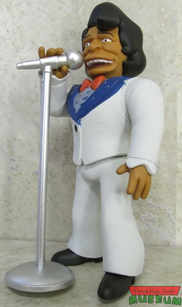 James Brown holding mic